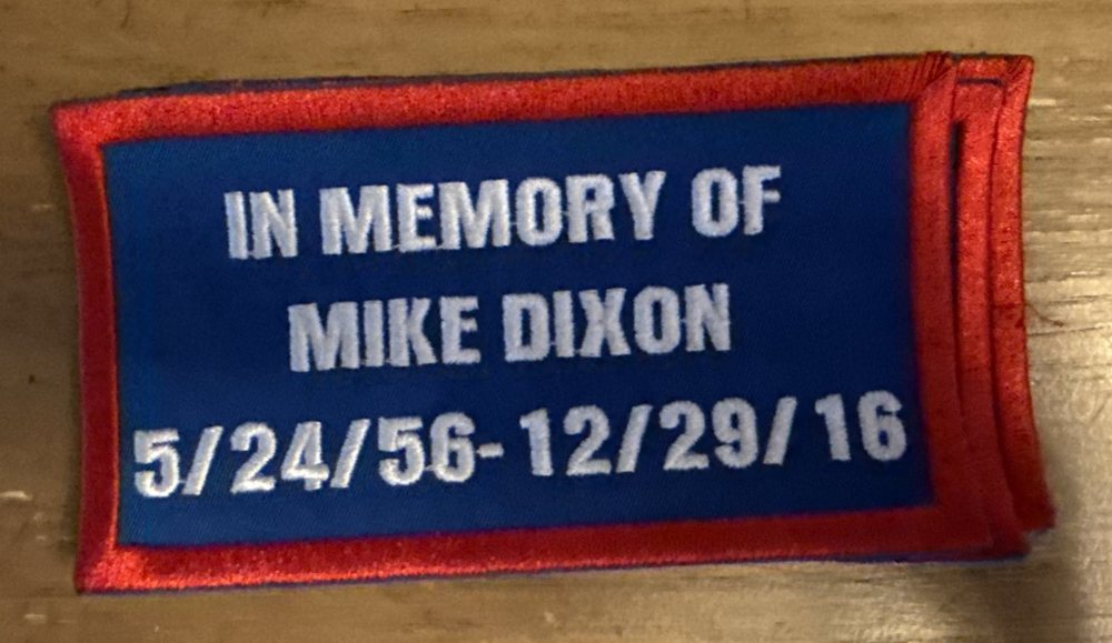 Embroidered patch reading In Memory of Mike Dixon, 5/24/56 to 12/29/16